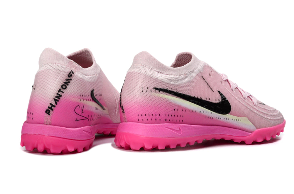 Chuteira Nike Phantom GX 2 Elite Society TF - Rosa