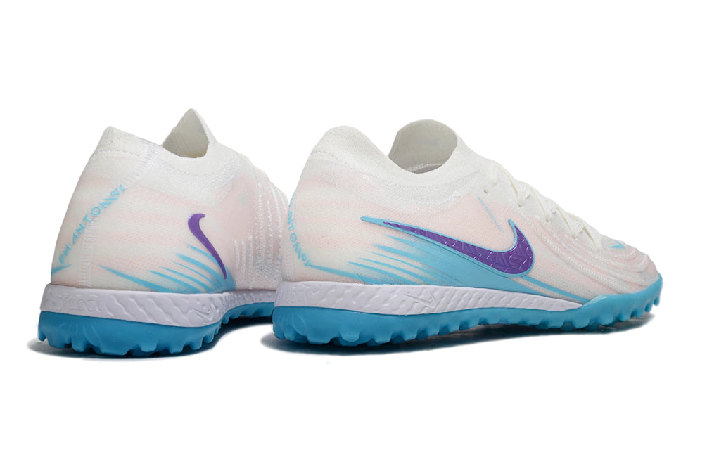 Chuteira Nike Phantom GX 2 Elite Society TF - Branco/Azul