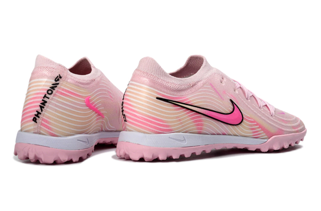 Chuteira Nike Phantom GX 2 Elite Society TF - Rosa