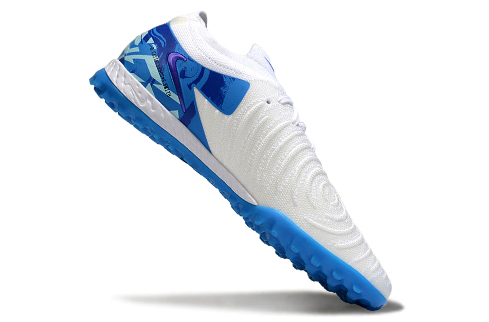 Chuteira Nike Phantom GX 2 Elite Society TF - Branco/Azul