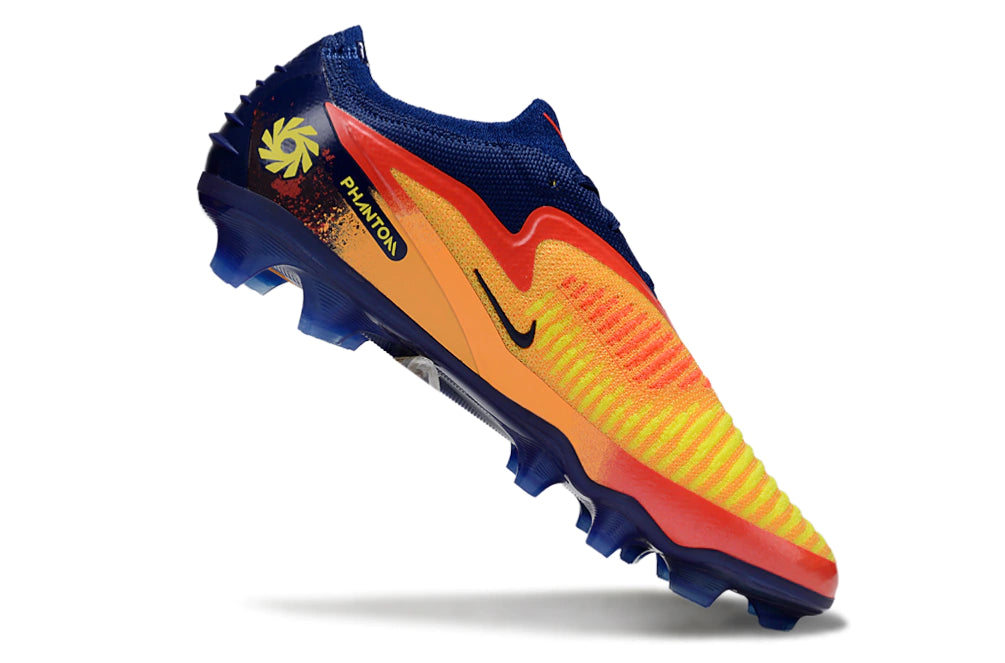 Chuteira Campo NIKE Phantom 6 Elite FG - Laranja/Azul