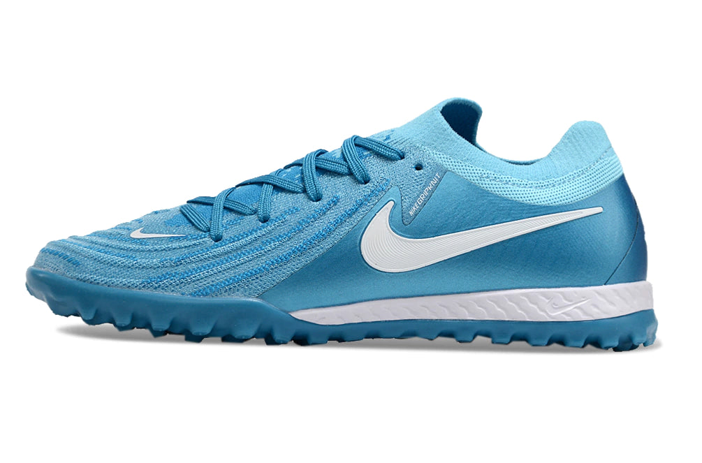 Chuteira Nike Phantom GX 2 Elite Society TF "Mad Ambition Pack"
