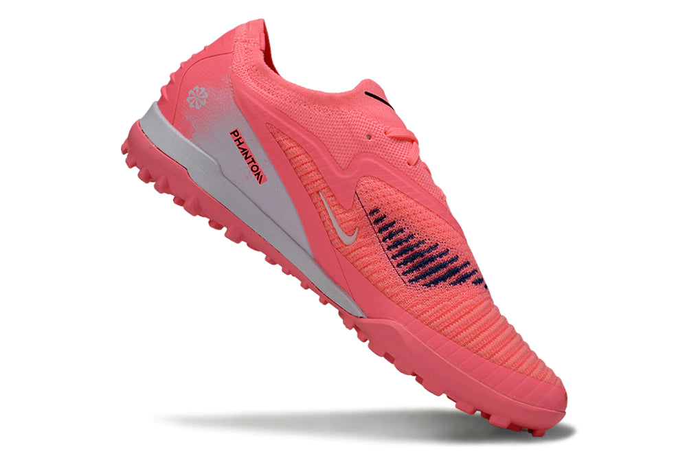 Chuteira Nike Phantom ReactX 6 Pro Society TF - Rosa