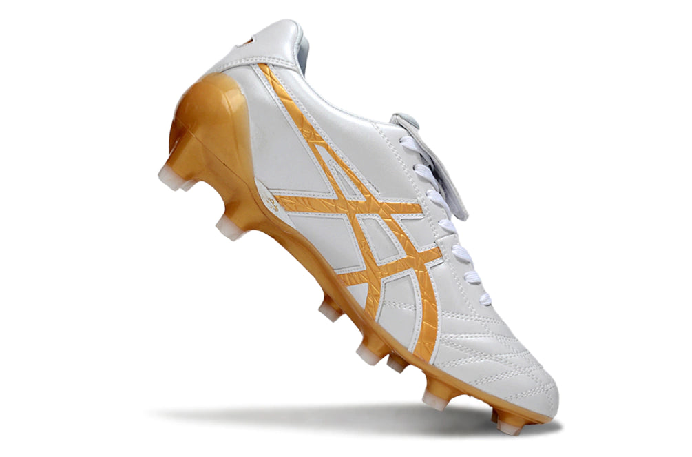 Chuteira Campo Asics Lethal Testimonial 4 IT - Branco/Dourando