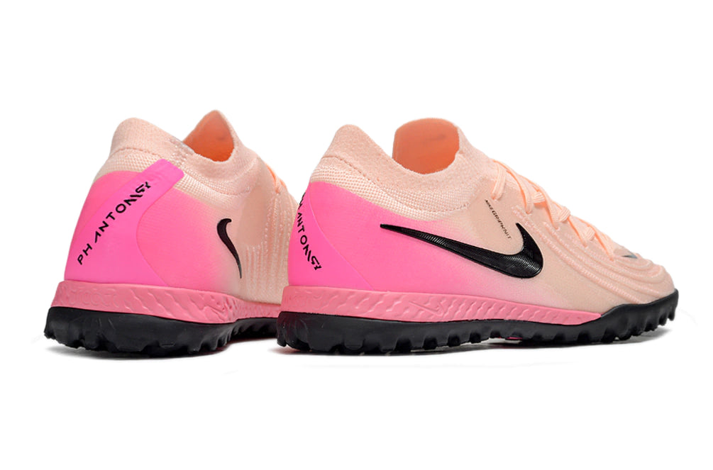 Chuteira Nike Phantom GX 2 Elite Society TF - Rosa