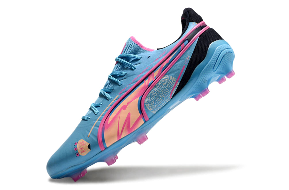 Chuteira Puma King Ultimate X FG - Azul/Rosa/Preto