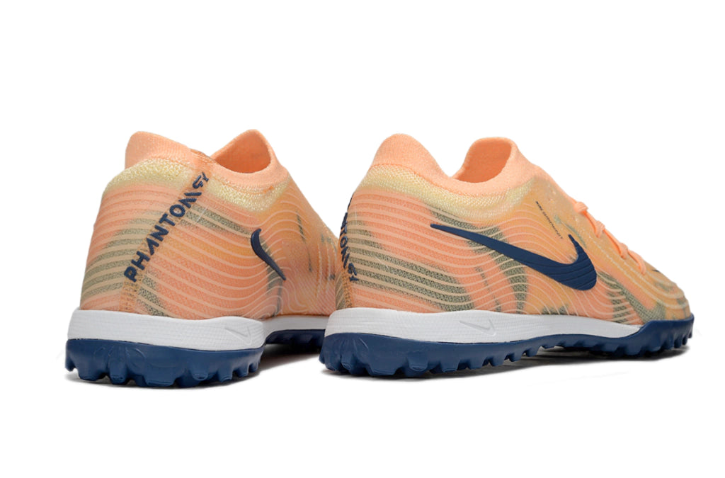 Chuteira Nike Phantom GX 2 Elite Society TF