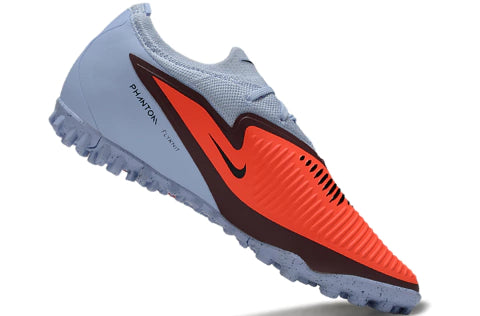 Chuteira Nike Phantom ReactX 6 Pro Society TF - Laranja/Azul