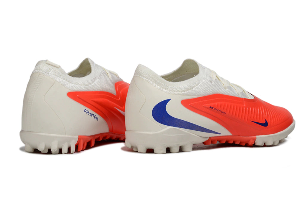 Chuteira Nike Phantom ReactX 6 Pro Society TF - Branco/Laranja