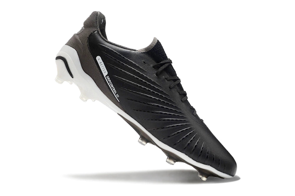 Chuteira Puma King Ultimate X FG - Preto/Branco
