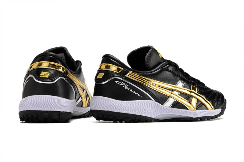 Chuteira Asics Japan Society - Preto/Branco/Dourado
