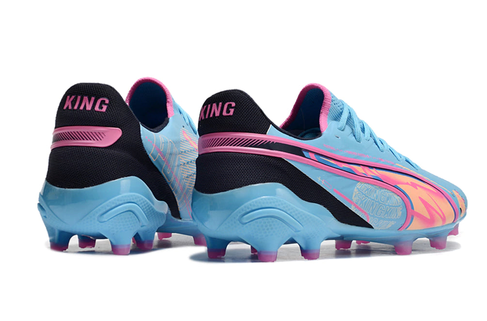 Chuteira Puma King Ultimate X FG - Azul/Rosa/Preto