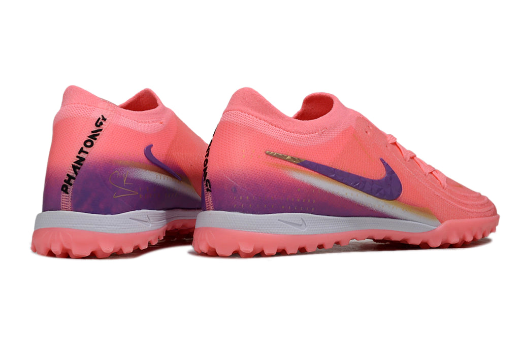 Chuteira Nike Phantom GX 2 Elite Society TF - Rosa