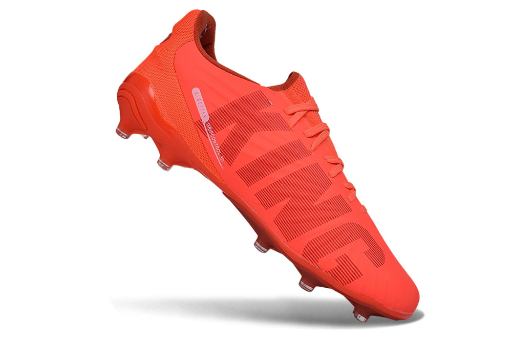 Chuteira Puma King Ultimate X FG - Laranja