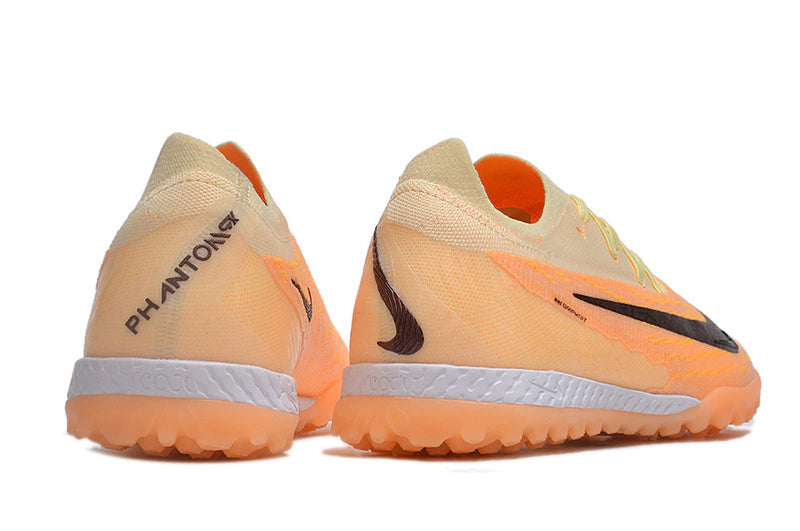 Chuteira Nike Phantom GX Elite Society TF "Blaze"