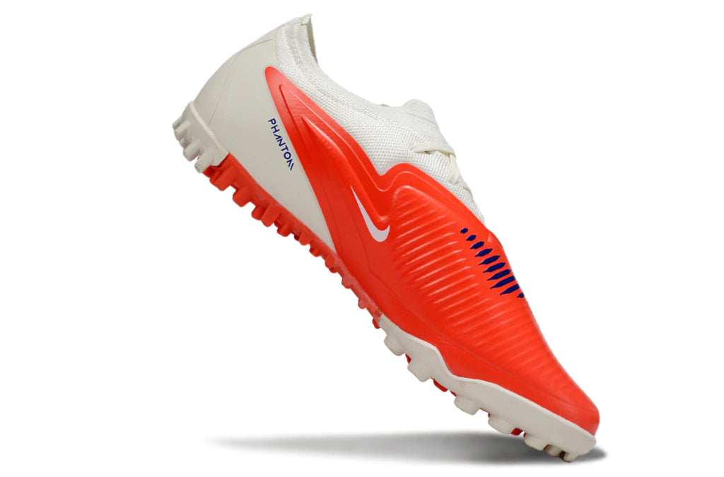 Chuteira Nike Phantom ReactX 6 Pro Society TF - Branco/Laranja