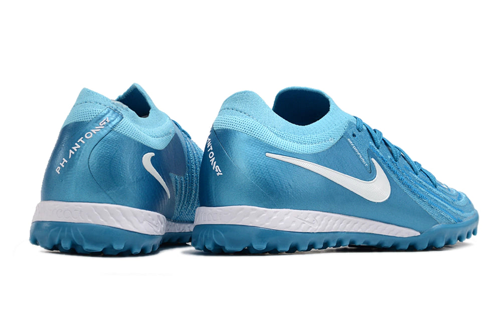 Chuteira Nike Phantom GX 2 Elite Society TF "Mad Ambition Pack"
